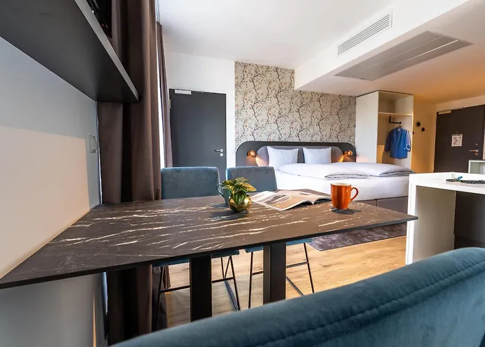 Apartmanhotel Maseven Frankfurt Messe 4*